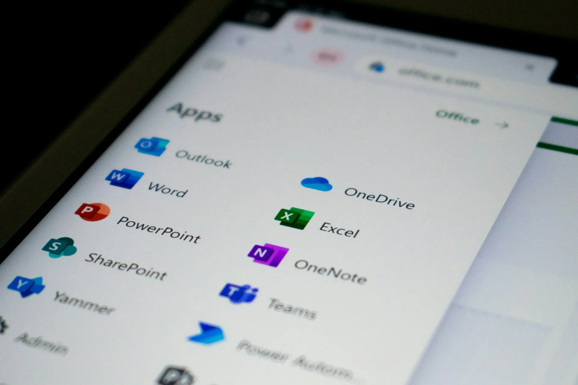 Microsoft 365 apps menu on a screen showing Outlook, Word, PowerPoint, Excel and Teams